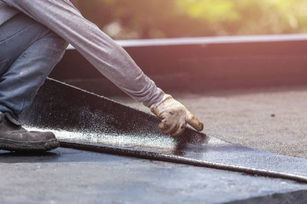 Professional Waterproofing technician working in Columbus, KS